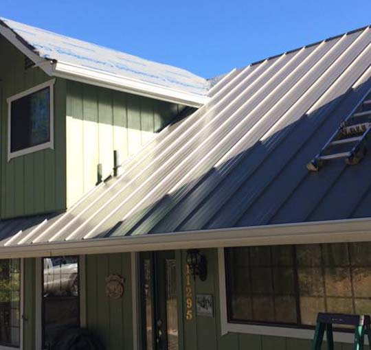 gutter installation on a metal roof in Manteca, California