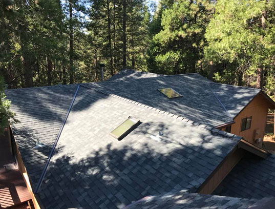 Roof installation in Tuolumne City with multiple skylights